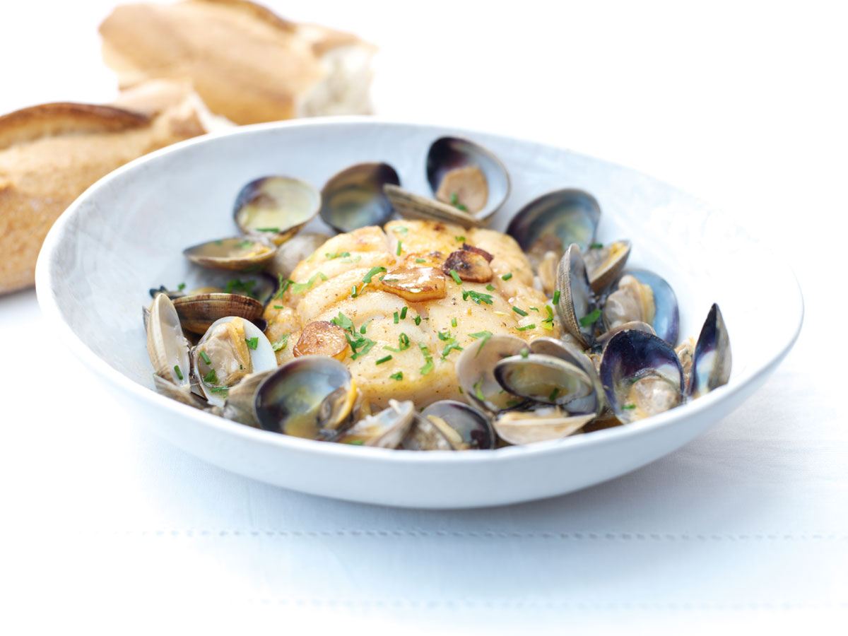 Cod with clams in a garlic-sherry butter sauce