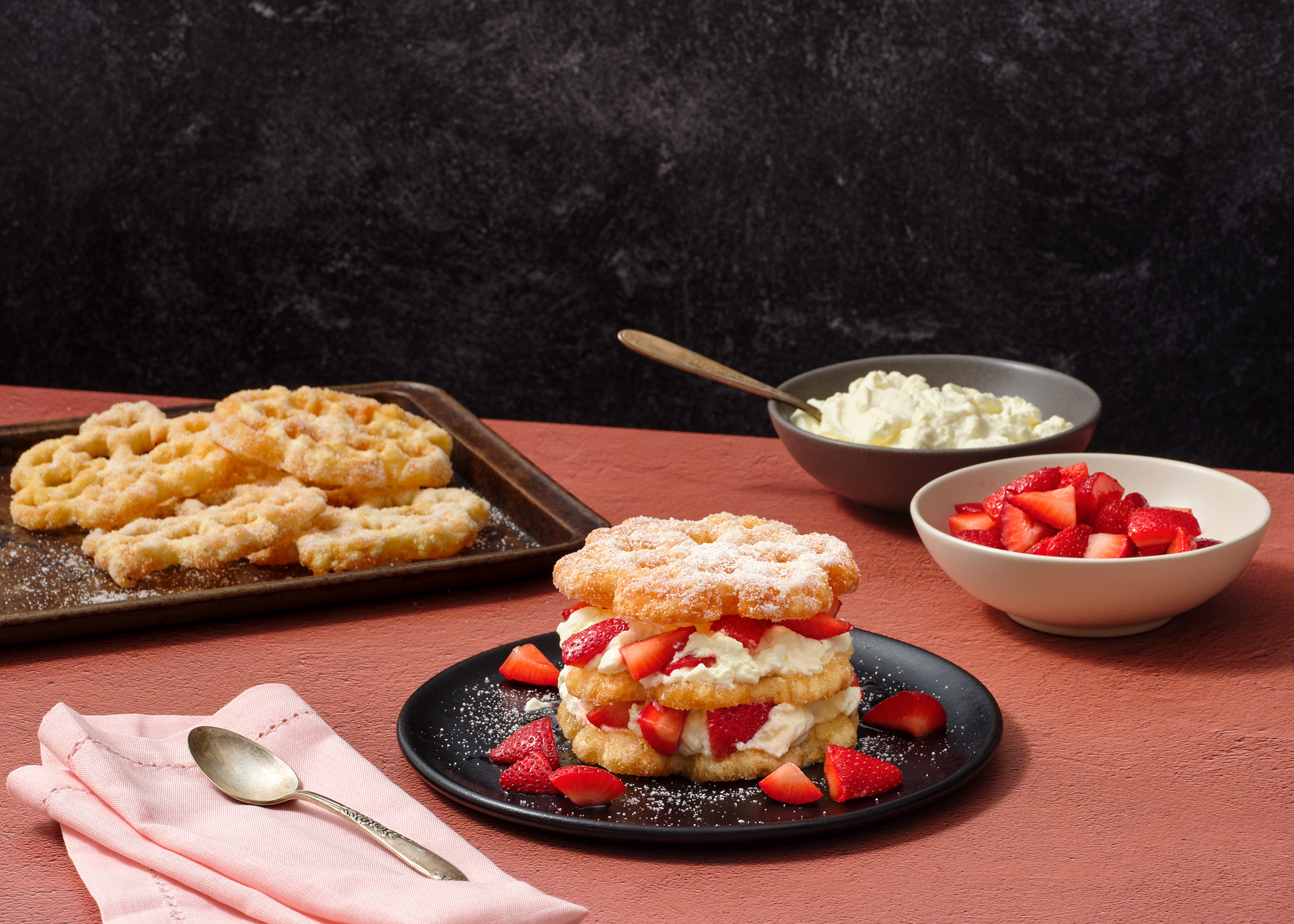Buñuelos de Viento with Whipped Cream and Strawberries