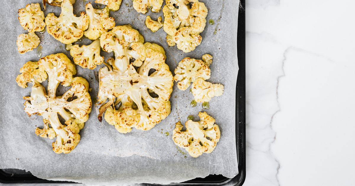 Pan-Seared Harissa Cauliflower Steaks with Whipped Feta and Pistachio Gremolata