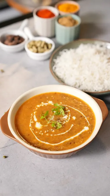 Mughlai Dal (Slow-cooked sabut moong with spiced yoghurt, butter and cream)