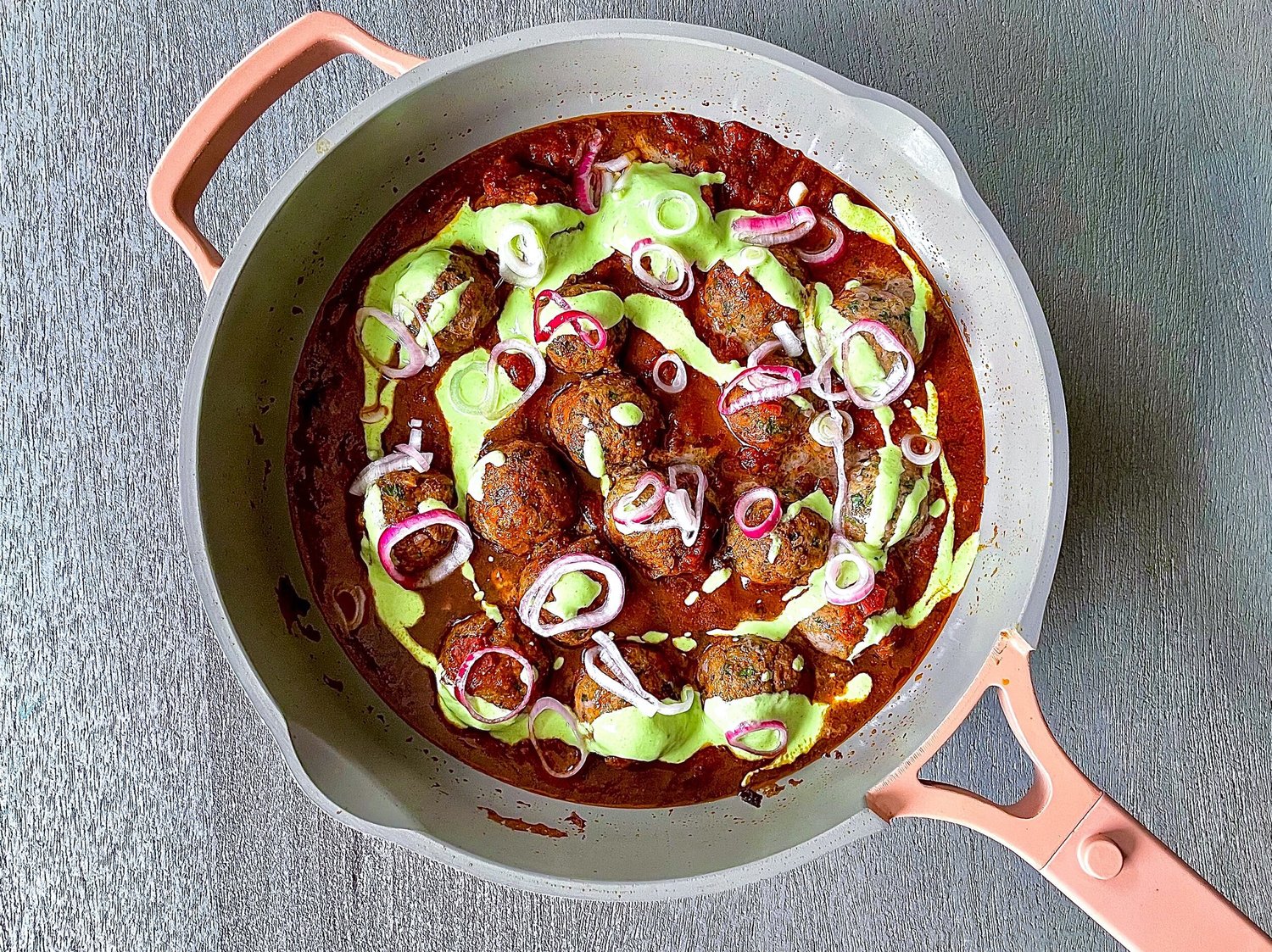 Kefta meatballs and tomato sauce tagine with jalapeño & herb yoghurt sauce