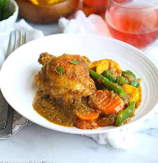 Poulet DG (French-style chicken and vegetable stew with fried plantain)