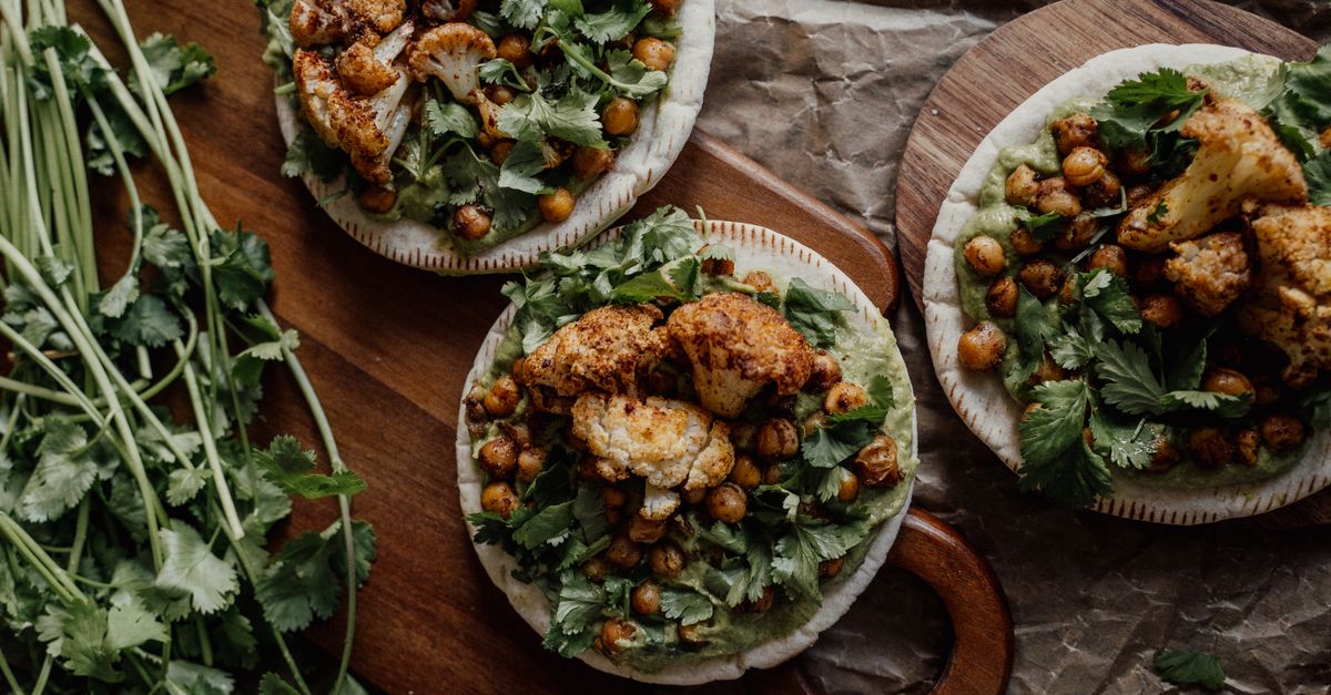 Roasted Cauliflower & Chickpea Bowl with Harissa Oil & Labneh