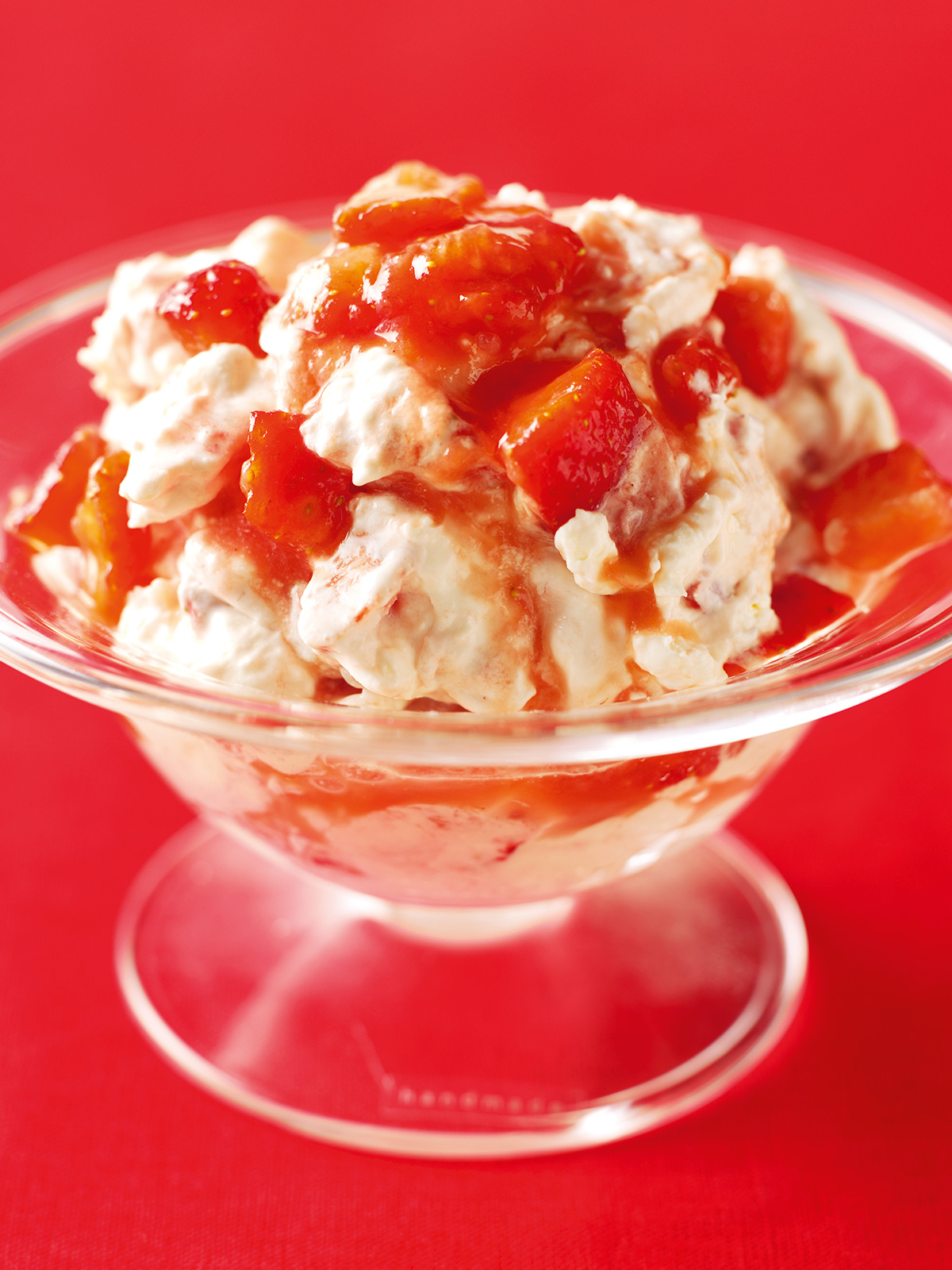 Eton Mess with pomegranate macerated strawberries and meringue