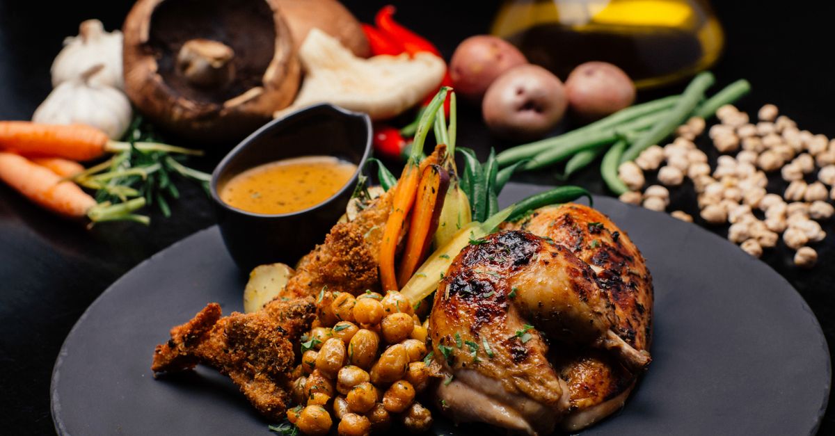 Moroccan Spiced Roasted Chicken with Charred Vegetables and Pomegranate Yoghurt