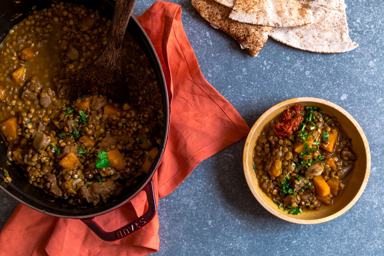 Lentil stew with lamb, pumpkin and shallots