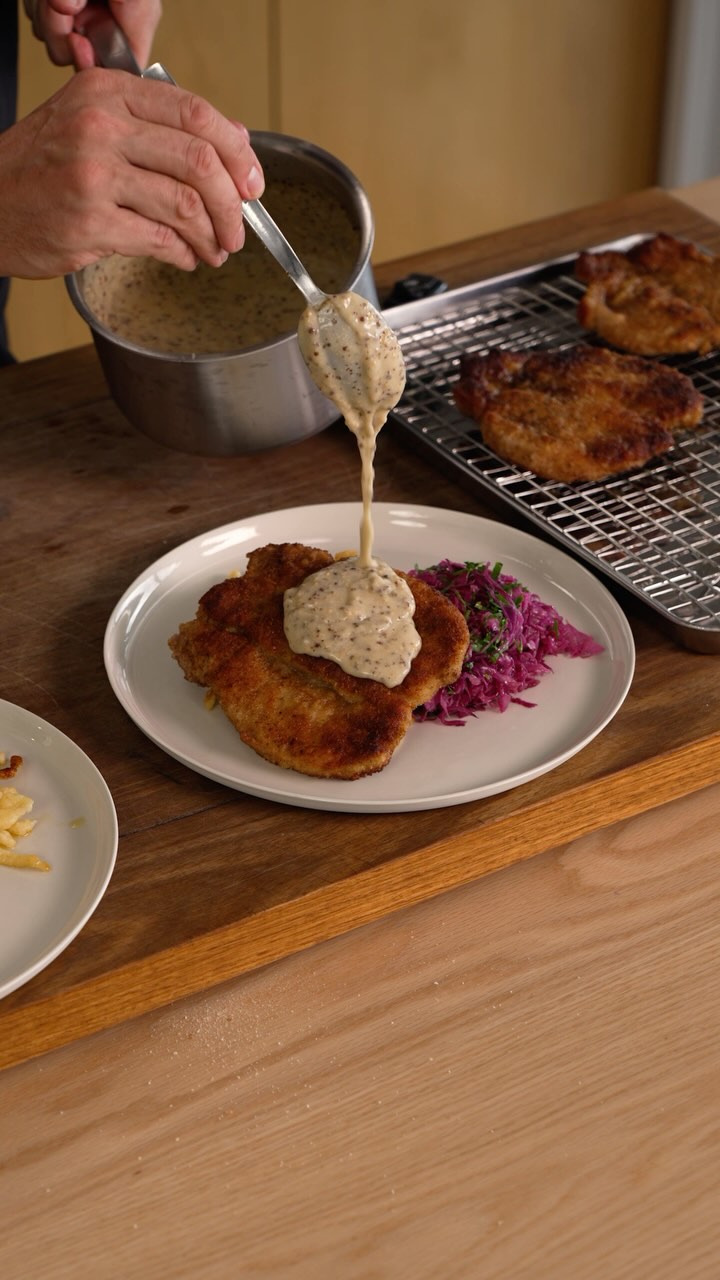 Pork schnitzel with spätzle and mustard sauce