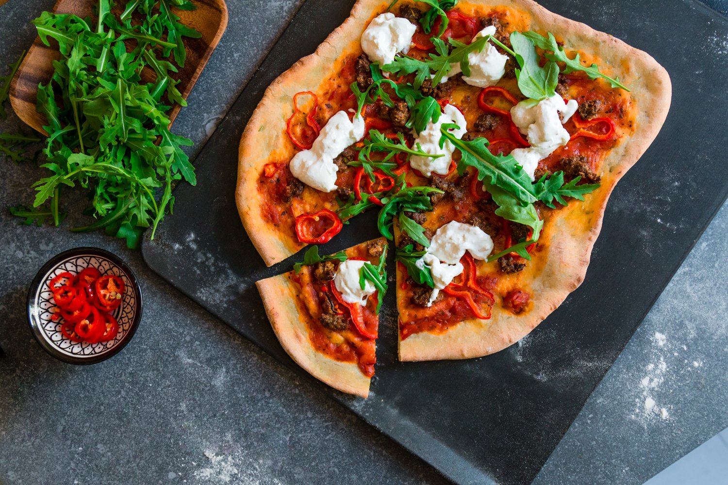 Merguez, red pepper and burrata pizza