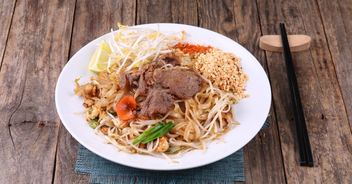 Thai-Spiced Beef Stir-Fry with Rice Noodles and Crispy Vegetables