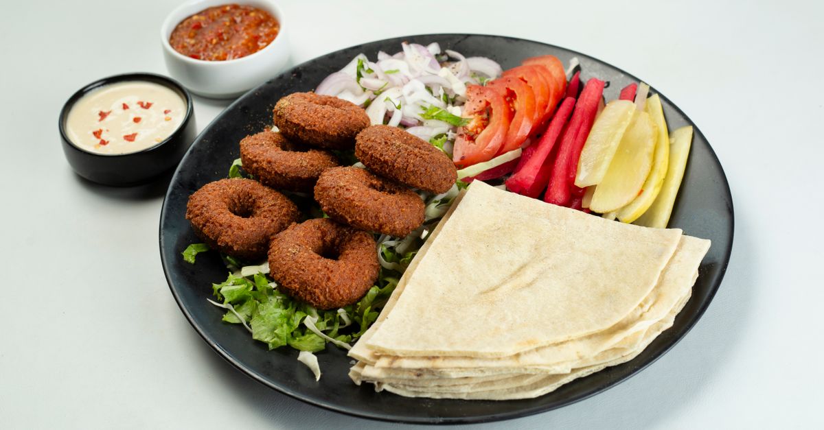 Crispy Falafel with Tahini Sauce, Roasted Vegetables and Flatbread