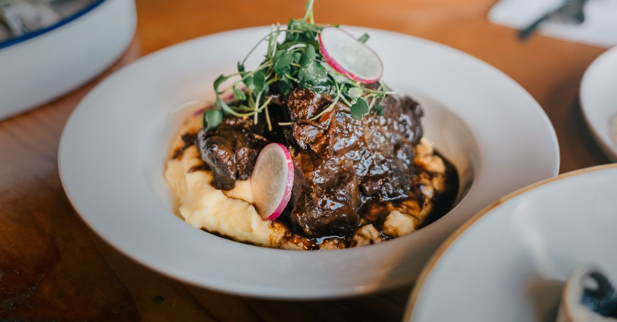 Braised Beef Shin with Tomato, Olives and Roasted Root Vegetables