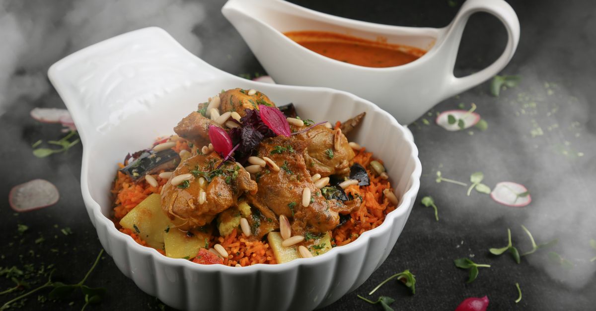 Moroccan Spiced Chicken Tagine with Apricots and Almonds