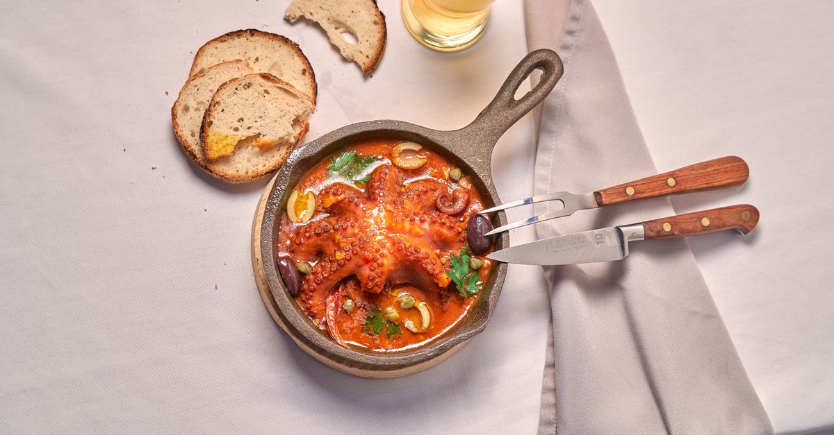 Braised Octopus with Cannellini Beans, Tomato & Rosemary